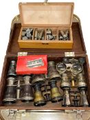 Collection of opera glasses and whistles.