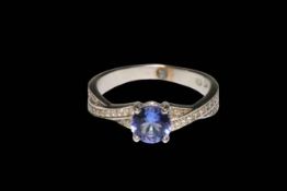 Tanzanite and diamond 9 carat white gold ring, size L/M, with papers.