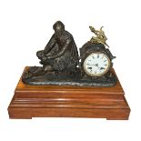 Ornate spelter Shakespeare figure clock on wood base, 32cm.