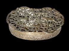 Wm Comyns silver box with pierced and chased lid, London 1910, 10cm across.