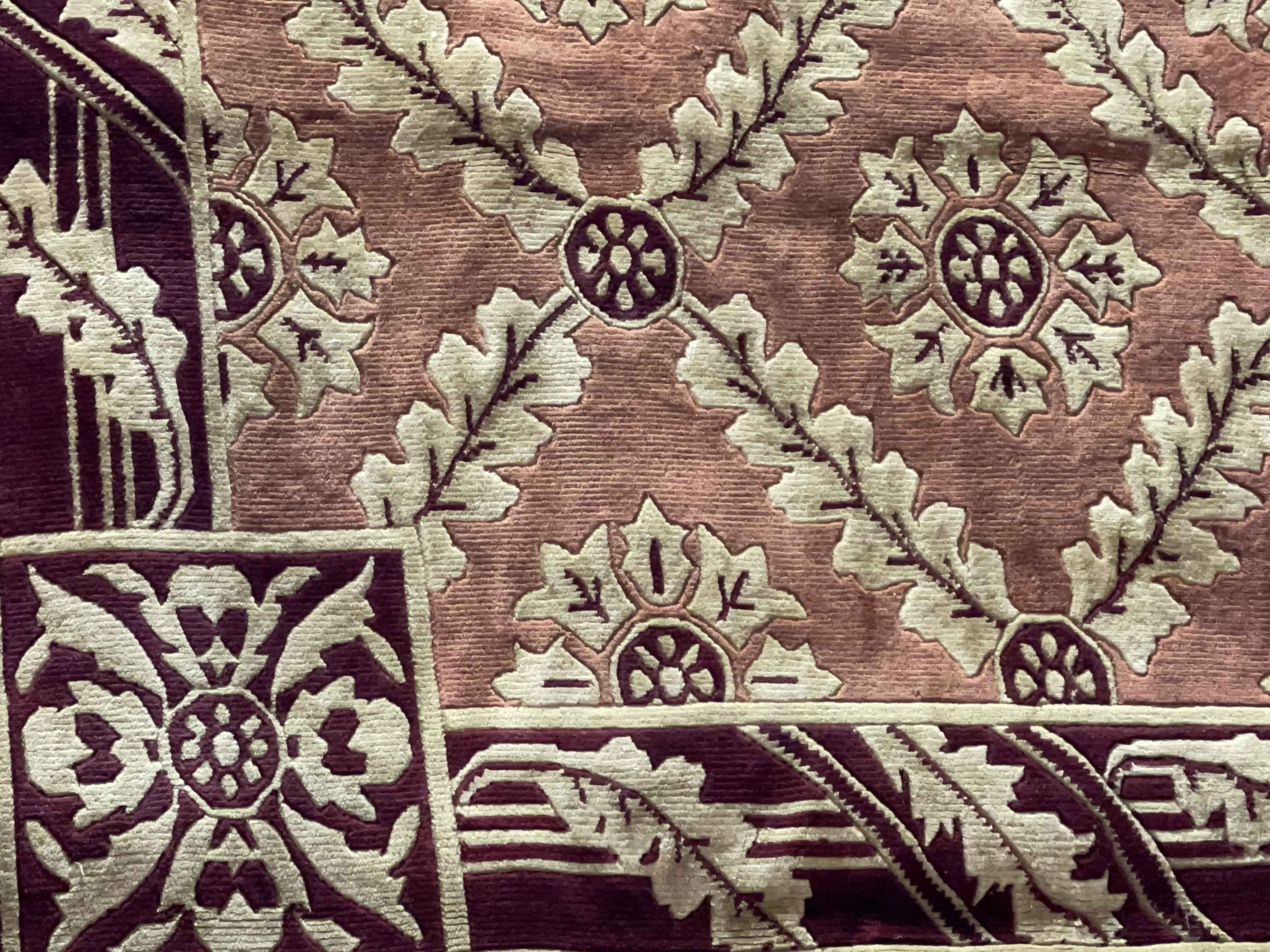 Rose pink and burgundy ground border carpet, 2.80 by 1.83. - Image 2 of 2