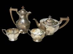 Silver four piece tea set with octagonal bodies, Sheffield 1931.
