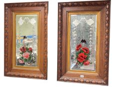 Pair Edwardian oak framed etched and floral painted wall mirrors, 82.5cm by 52.5cm including frame.
