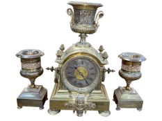 Ornate gilt metal three piece garniture clock set, clock 42cm high.