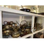 Collection of brass and copper wares including candle holders, scales with weights, jam pan,