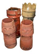 Four chimney pots including pair terracotta, tallest 91cm.