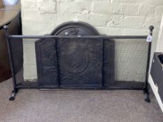 Cast iron Fleur de Lys fire back, cast iron screen, three stone bottles and stone jar (6).