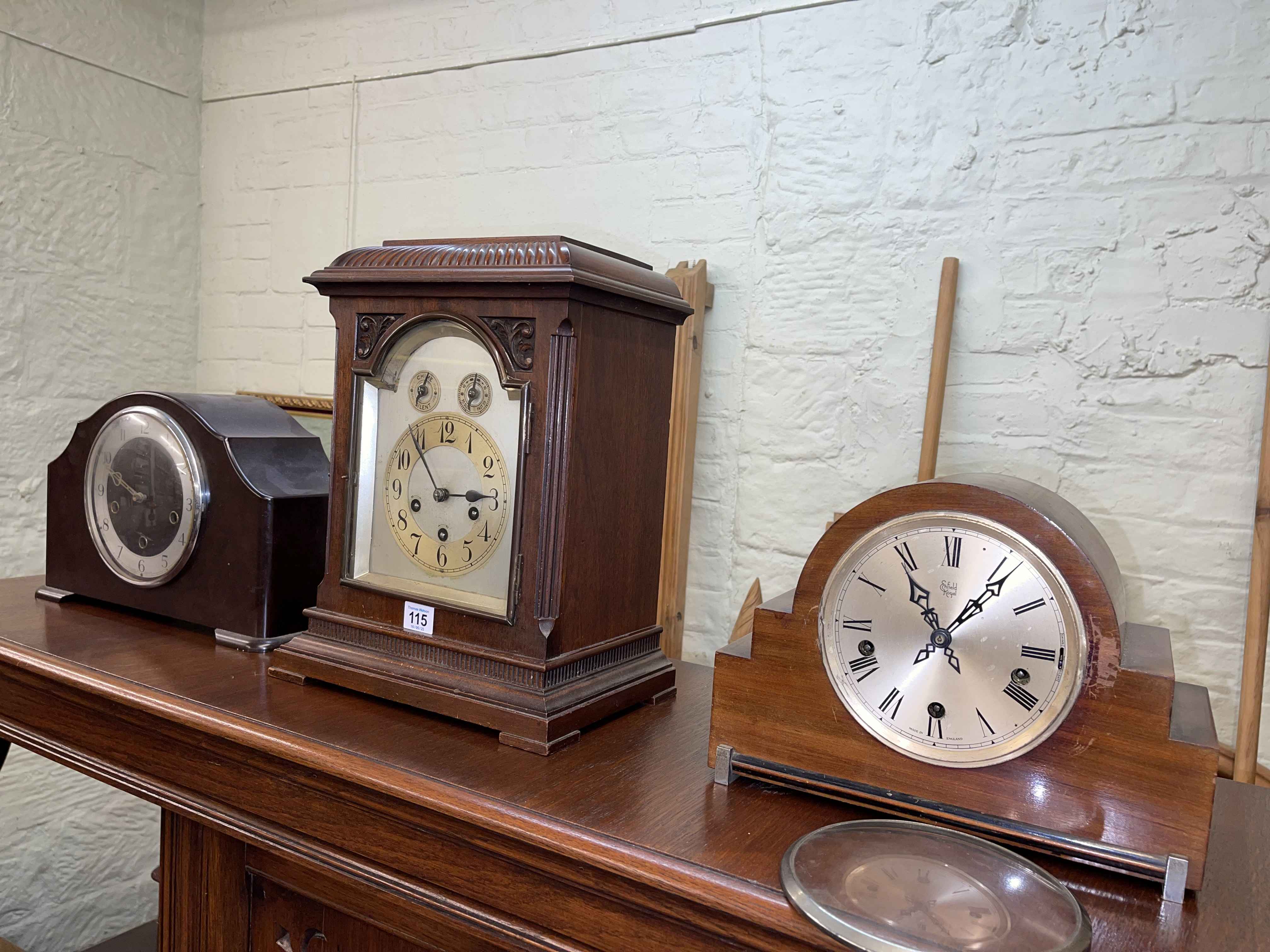 Three mantel clocks including Enfield Royal.