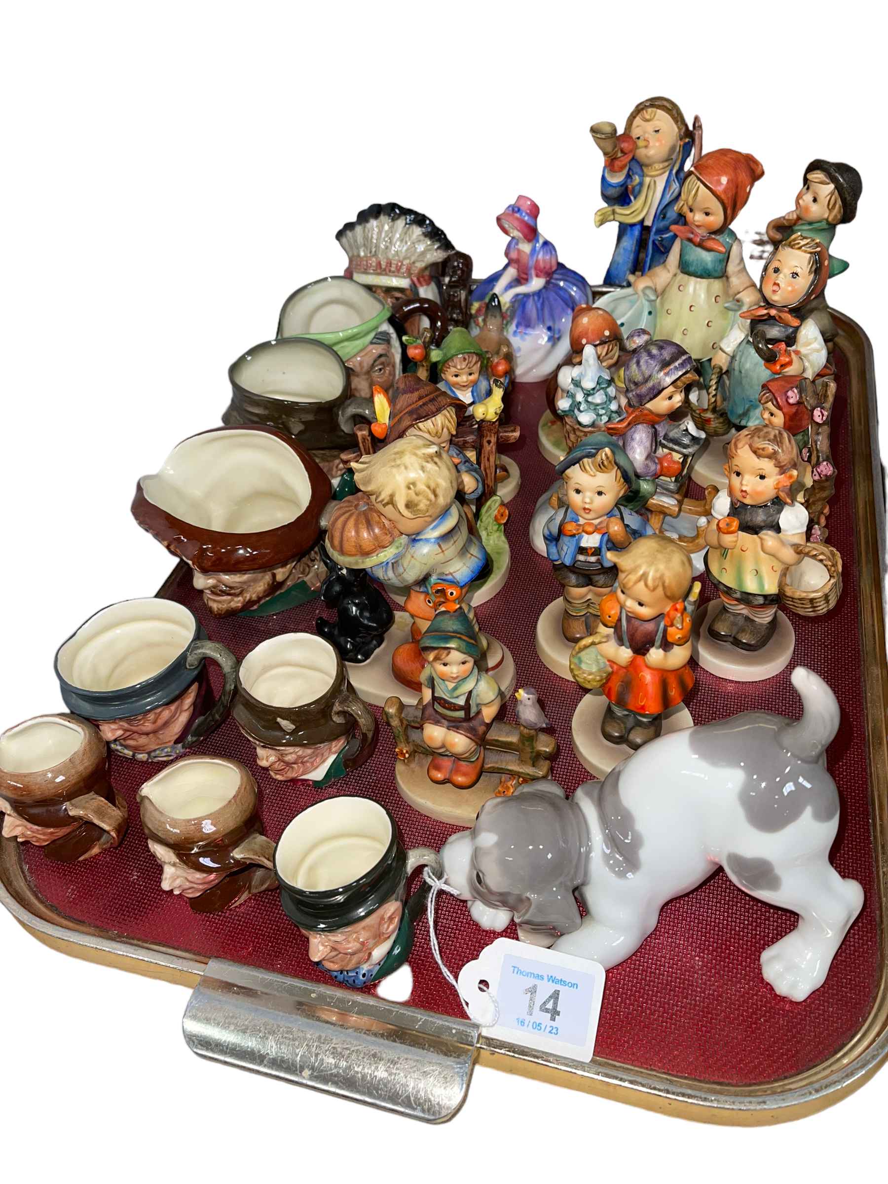 Tray lot with fourteen Hummel figures, nine Royal Doulton character jugs, Royal Doulton Monica,