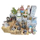 Nine Beatrix Potter money boxes and others, and nine Yesterday's Child sculptures, all boxed.