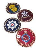 Four cast metal armed forces plaques.