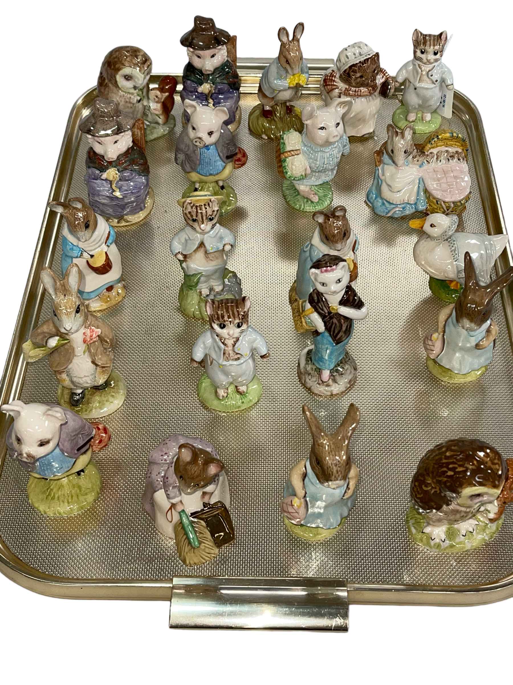 Collection of twenty one Beswick Beatrix Potter figures including four gold backstamp, Mr Brown,