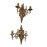 Pair of ornate brass two branch wall sconces.