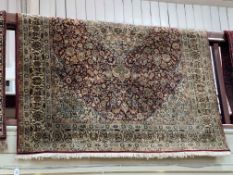 Kashmir hand knotted silk rug 2.20 by 1.58.