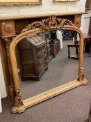 Continental pine fire surround and overmantel mirror.