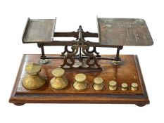 Set of postal scales and weights.