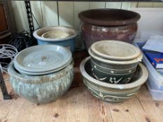 Collection of eleven decorated earthenware planters.