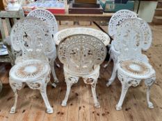 Five piece cast patio set comprising circular table and five chairs (3x2),