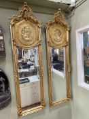 Pair gilt lady portrait rectangular bevelled wall mirrors, 178cm by 53cm.