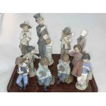 Collection of Nao figurines of Boys including Boys with Dogs, Rabbits, Teddy and Bird.