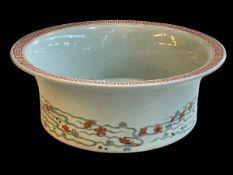 Large Chinese porcelain basin decorated with lake scene and geometric decorated rim, 34cm diameter.