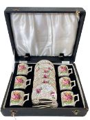 James Kent Old Foley rose decorated coffee cups, saucers and spoons, cased.