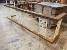 Pair stained wood and cast iron altar rails, 68cm by 268cm by 54cm, together with an oak altar rail,