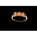 Topaz three stone 9 carat gold ring, size P/Q.