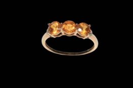 Topaz three stone 9 carat gold ring, size P/Q.