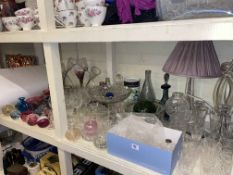 Collection of glass including paperweights, table lamps, comport, coloured glass, etc.