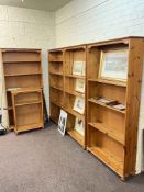 Set of five pine open bookcases, four large and one small, larger 186cm by 90cm by 10cm.