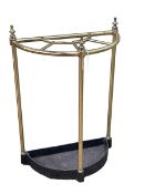 Brass and iron bow front five division stick stand, 60cm by 40.5cm by 20cm.