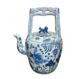Blue and white large Oriental teapot, 63cm high.