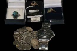 Two 9 carat gold gem set rings, silver ring and coin bracelet, and Seiko watch.