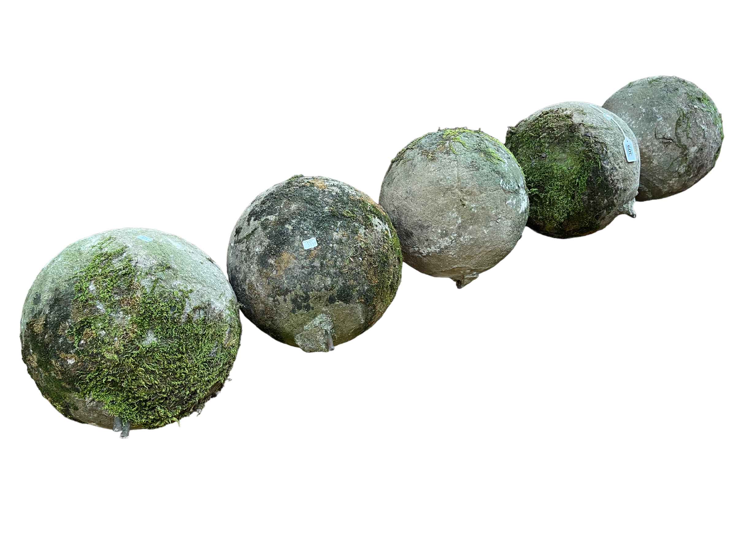 Set of five weathered garden orbs.