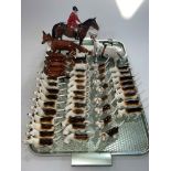 Beswick Huntsman and Huntswoman on Horseback, large Fox and five small Foxes, 37 hounds,