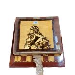 Marquetry chess board and a marquetry aviation interest plaque.
