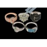 Four silver gem set buckle rings and Silver Alexandrite limited edition ring, size N/O,