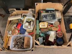 Two boxes of collectables including tins, keys, Burago Diecast toy car, Wade, etc.