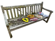 Weathered teak? garden bench, 152cm by 83cm by 57cm.