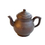 Chinese Yxing teapot decorated with calligraphy impressed mark to base, 12cm high.