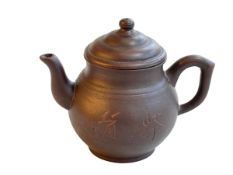 Chinese Yxing teapot decorated with calligraphy impressed mark to base, 12cm high.