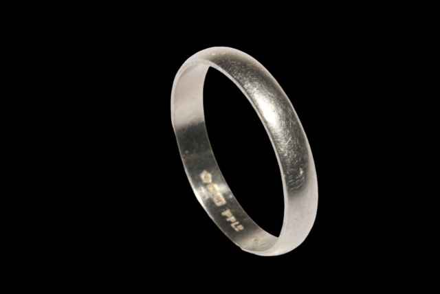 Platinum wedding band, size Q½.