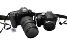 Canon EOS 10D Digital camera, with Sigma 70-300mm lens and Lumix FZ45 camera.