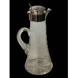 Edwardian silver topped claret jug, with embossed and chased hinged lid, Birmingham 1905, 27cm high.