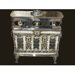 Ornate Sheffield plate engraved decanter box raised on four lion mask and paw feet,