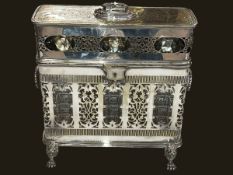 Ornate Sheffield plate engraved decanter box raised on four lion mask and paw feet,