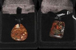 Two Boulder opal pendants.