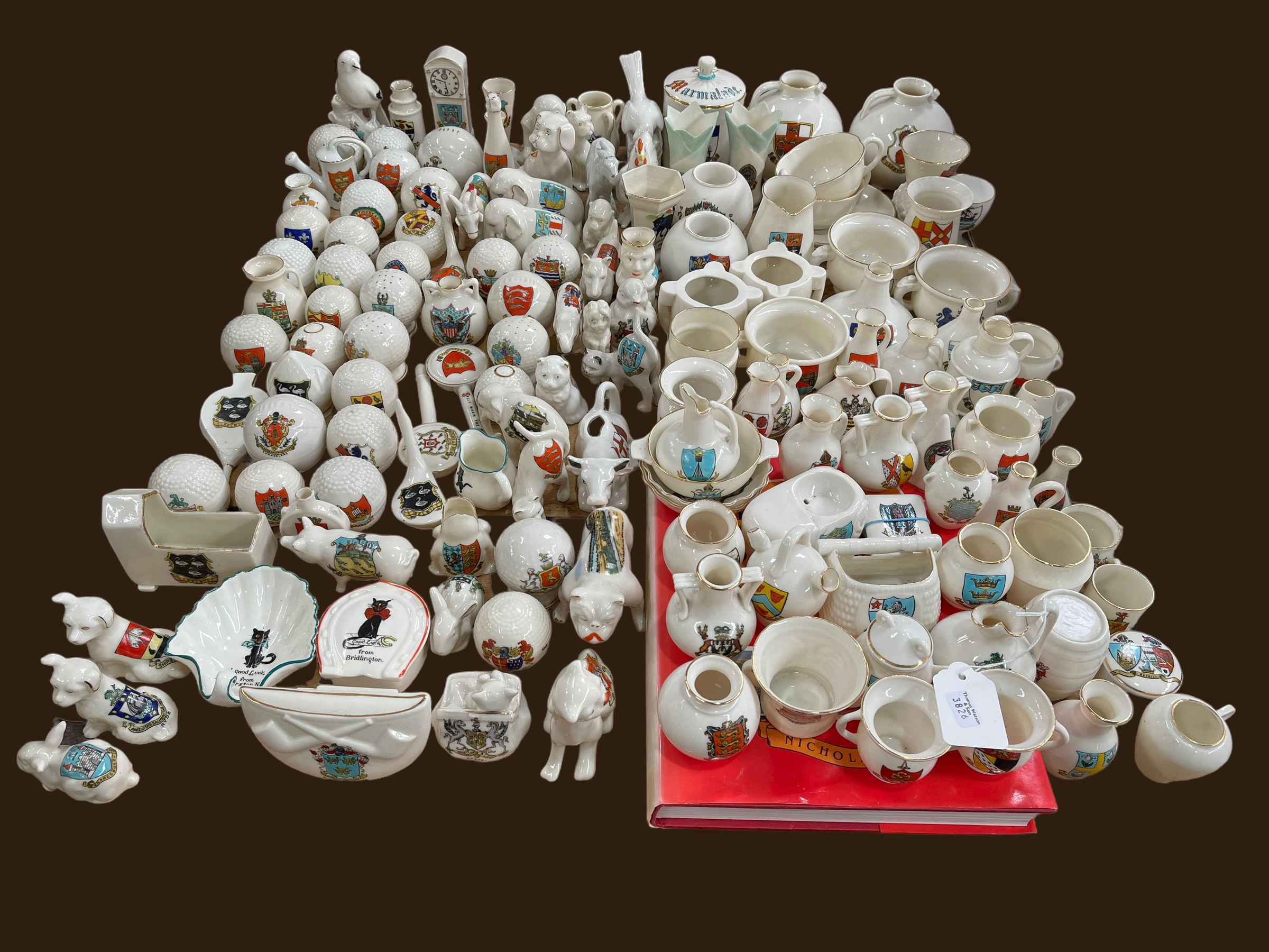 Collection of crested china including Goss, good luck black cats, guide book, etc.