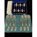 Boxed set of twelve silver teaspoons and tongs by Walker & Hall, Sheffield 1934,